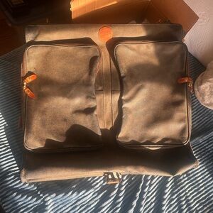 Bric's Black Travel Bag with Durable Design and Spacious Compartments